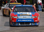 Matt Kenseth driving through garage area in Las Vegas