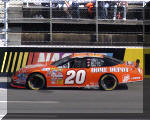 Tony Stewart makig a run down the backstretch at Martinsville