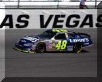 Jimmie Johnson Driving through Turn 4