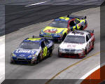 Jimmie Johnson pass a very loose Kasey Kahne